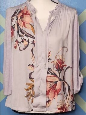 Anthropologie-Meadow Rue Blouse Floral Lavender Tie-Neck. PTP 19”. Length 24 EUC